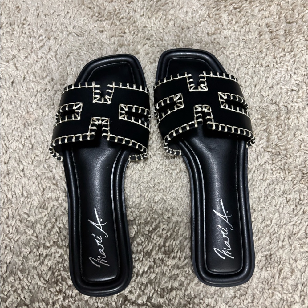 Black sandals. Never worn. New without tags